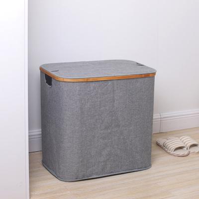 China Modern Wholesale Bamboo Rim Circular Laundry Hamper Storage Folding Basket With Lid for sale