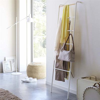 China Modern Wall Mounted White Metal Organizer Rack Shelf Easy Clothes Drying Hanging Racks for sale