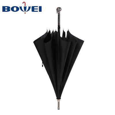 China Promotional Luxury Skull Black Straight Rainproof Big Large Handle Car Umbrella Metal Car Windproof Automatic Umbrella for sale