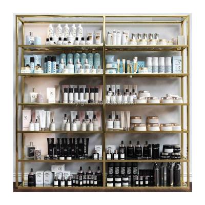 China Supermarket gold shop display rack glass shelves metal cosmetic furniture store makeup retail display stand for perfume for sale