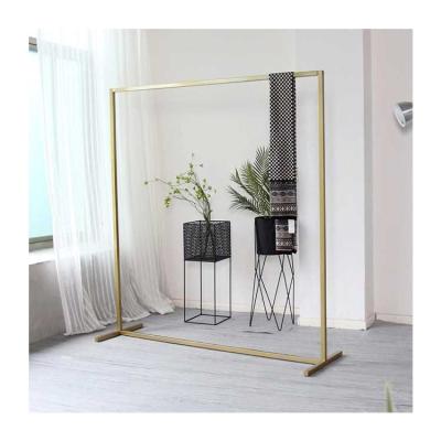 China Custom Modern Gold Metallic Furniture Store Shop Boutique Pop Hanging Clothes Rack Clothing Store Display Stand For Retail for sale