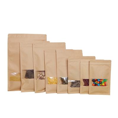 China Recyclable Brown Kraft Paper Zip Lock Pouches Flat Bags With Window Clear Food Packaging Brown Zipper Pouch Custom Printed for sale