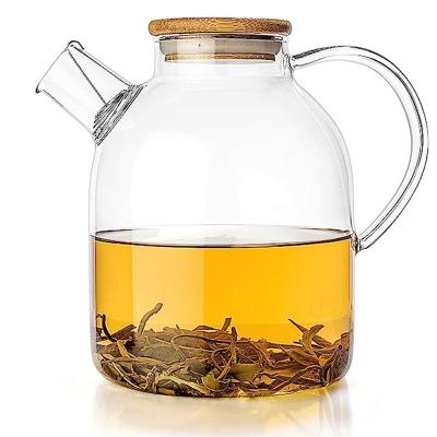 China BSCI Glass Tea Kettle Pitcher 1000ml 1800ml High Borosilicate Lid Lifting Teapot Viable Handle Bamboo Clear Glass Teapot for sale