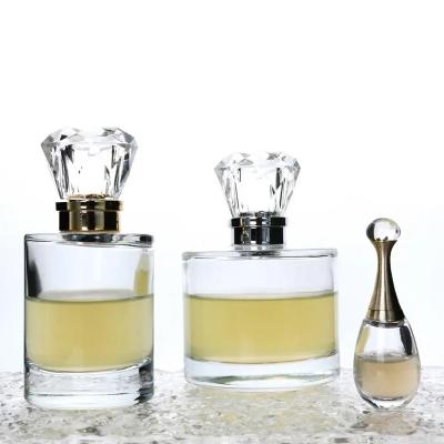 China Newest Design 30ml 50ml 100ml Cosmetic Clear Spray Packaging Glass Custom Logo Perfume Bottle for sale