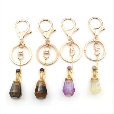 China Modern Wholesale Custom Natural Rose Amethyst Perfume Bottles Crystal Key Chain For Gift for sale