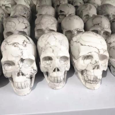 China Europe Wholesale Hand Carved Crystal Skulls Craft Carving Clear Crystal Head Skulls White for sale