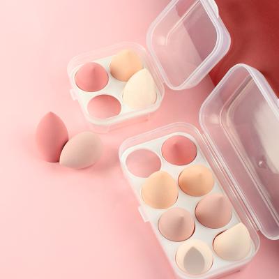 China Cute Hydrophilic Non-Latex Macaroon Color Beauty Egg Stretch Tops Sponge Wet And Dry Makeup Egg Set for sale