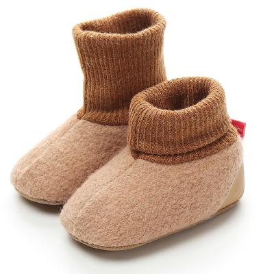 China Amazon Cute Fashion Fashion Trend Unique Newborn Infant Rubber Baby Bootsrn Pom Pom Baby Toddler Fur Girl Booties for sale