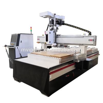 China 3d carving woodworking 1KW Japan Yaskawa servo motor 9kw spindle atc cnc router woodworking cnc 4 spindle 1325 for sale