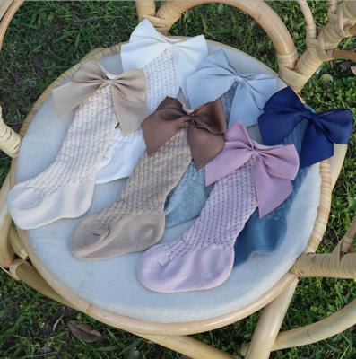 China 2021 QUICK DRY New Stock 6 Colors Bow Work Solid Color Bow Work Breathable Royal Infant Girl High Socks Open Thin Spanish Soft Knee High Socks For Baby for sale