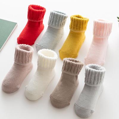 China 2021 Winter Fleece Fuzzy Anti-skid Glue Fleece Thickened Anti-skid Glue Baby Socks Breathable Warm Baby Socks Running Winter 8 Colors for sale