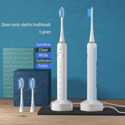 China Waterproof Portable Cheap Radio Smart Electric Toothbrush 5 Electronic Rechargeable Battery Operated Modes Use Protective Erasers for sale