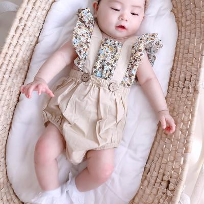 China Cozy Baby Clothes New Arrival Statistical Princess Baby Sling Triangle Korean Floral Cute Baby Rompers for sale