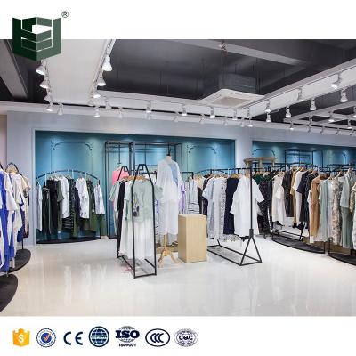 China Wooden Display Products Flsm Customized/OEM/ODM Display Showroom Fixtures Shelf Props Wholesale Clothing Display Racks Stand Up Women's Store for sale