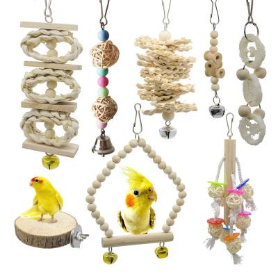 China Stocked 7 Pcs Bird Parrot Swing Chewing Toys Set Natural Wooden Hanging Bell Birdcage Toys for sale