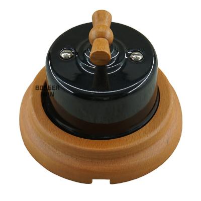 China Safety One Way Vintage Porcelain Strip Double Way Rotary Switch With Wood Frame Black Switch for sale