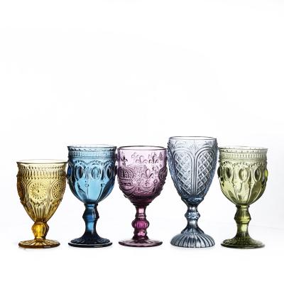 China Sustainable Stocked Wholesale Machine Pressed Novelty Decorative Colored Embossed Wine Glass for sale