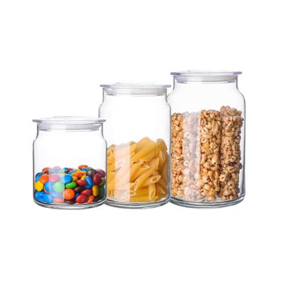 China Steamable Large Capacity Size Handmade High Borosilicate Glass Airtight Storage Jars Set With Bamboo Lids for sale