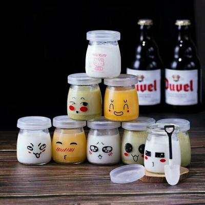 China Wholesale Empty Packaging Beverage Factory Price Pudding Glass Jar With Aluminum Plastic Cap for sale