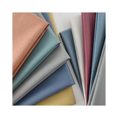 China Best Quality Stretch PU Waterproof Durable Faux Polyester Fabric 100% Leather Fabric For Sofa Home Textile for sale