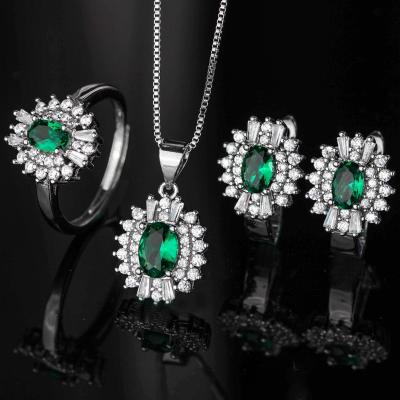 China CLASSIC Wholesale Green Zircon Colored Gemstone Wedding Jewelry Set Red Crown Sun Flower Necklace Earrings Ring Set For Women for sale