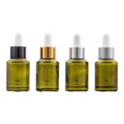 China 30ml Cosmetic Serum Glass Bottle Cosmetic White Dropper Essential Oil Luxury Green Liner Glass Bottle for sale