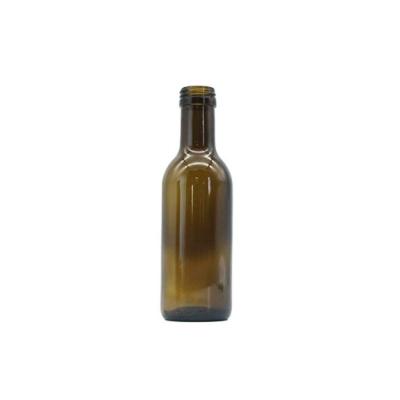 China Hot Selling Good Quality Beverage Clear 250ml Green Glass Wine Bottle With Screw Cap for sale