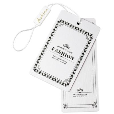 China Custom Paper Material Clothing Hang Tags And Personalised Swing Tags for sale