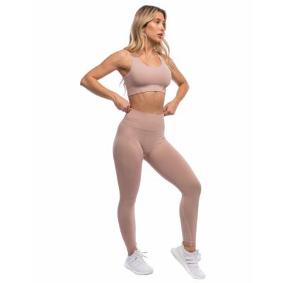 China Anti-Bacterial New Women Workout Sets Scrunch Butt Leggings Open Back Sports Bra High Waist Women Yoga Pants Leggings Seamless Yoga Set for sale