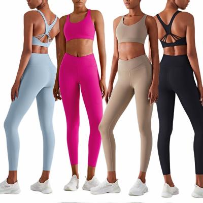 China Anti-Bacterial Fitness Low Impact Yoga Bra Women 2 Piece Yoga Cross Wrap Waist Leggings Sets for sale