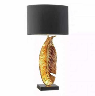 China Modern unique design the collision of gold and black modern led desk lamp for sale