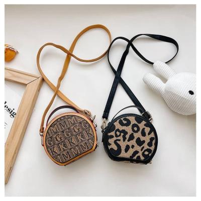 China Fashion Luxury Designer Cute Mini Round Shoulder Cross-body Bag Coin Purse For Girls Boys Children Kids for sale