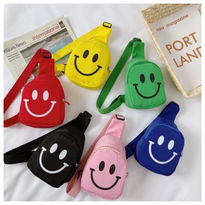 China Water Resistant Cartoon Face Baby Chest Light Cute Nylon Lightweight Smiling Cross - Body Bag For Kids Children for sale