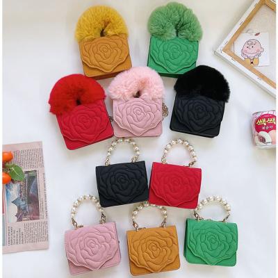 China New Mini Elegant PU Flower Wool Hand Carrying Frosted Cross-body Handbag For Girls Children for sale