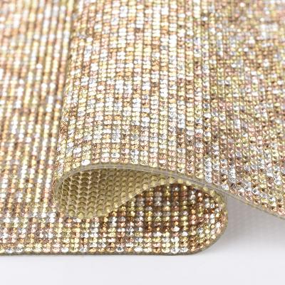 China Hotfix Brand Rhinestone LOCACRYSTAL Mesh Fabric Sheet Rhinestone Sheet Hotfix For Fabric for sale