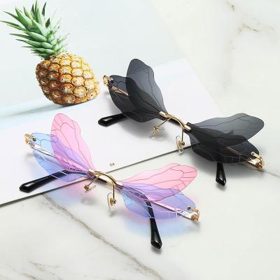 China 2021 Fashion Luxury Trendy Women's Rimless Butterfly Shaped Frames Sun Glasses Sun Glasses for sale