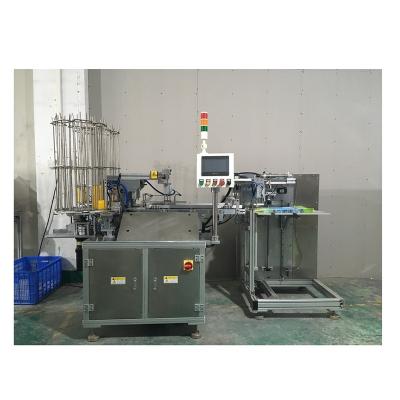 China Automatic Food Flexible Packaging Equipment Rice Pouches Loop Pressing Machine for sale