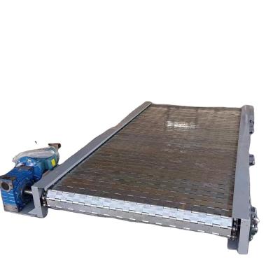 China Heat Resistant Steel Slat Conveyor For Bulk Material Handling for sale