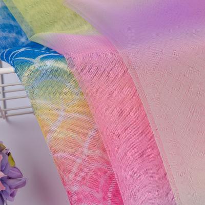 China Gradient Rainbow Tulle Fabric Colorful Printing Tear-resistant Tulle Fabric Soft Tulle Fabric For Dress for sale