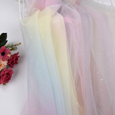 China Rainbow Print Sequin Fabric Tear-resistant Sequin Tulle Fabric Digital Print Glitter Tulle Tulle For Dress for sale