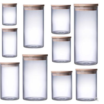 China Viable Wholesale Cheap Price Food Grade Airtight Storage Glass Jar With Wooden Lid for sale