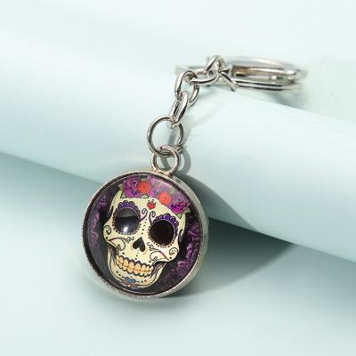 China Sugar Skulls Glass Pendant Metal Double Face Handmade Glass Buddhist Pendant Silver Key Chain Dome Key Chain Souvenir Gift Jewelry for sale