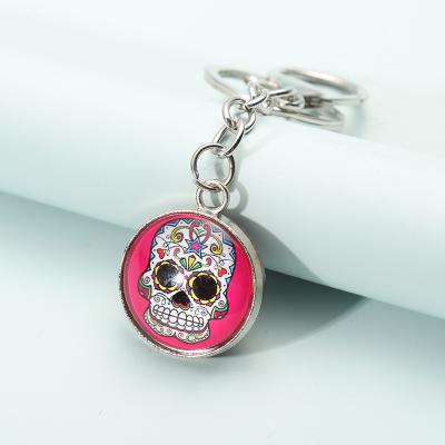 China Silver Sugar Skulls Glass Pendant Metal Key Chain Friendship Gift New Souvenir Gift Handmade Pendant for sale