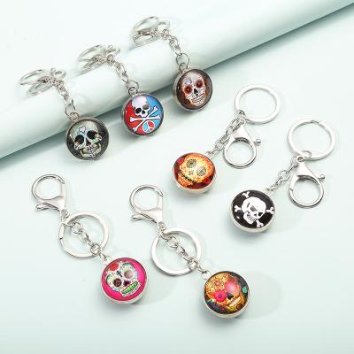 China Customizable Rotating Key Ring Handmade High Quality Glass Skulls Pendant Stainless Steel Key Chain Souvenir Gift for sale