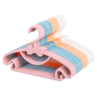 China Lightweight Children's Plastic Clothes Hanger With Nothches Plastic Hanger With Hooks for sale