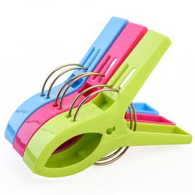 China Bathroom Beach Towel Clips For Beach Chairs 4 Color Large Plastic Clothespin Towel Clips for sale