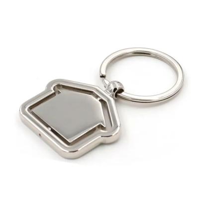 China Metal Wholesales Custom House Shaped Luxury Metal Key chain Rotating Spinning Gift Keychain for sale