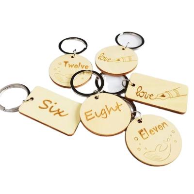 China Wood Wholesale high quality promotional gifts bamboo Keychains customize engraved logo blank wooden keychain for sale