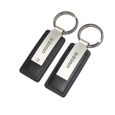 China Leather Promotional Gift Custom Embossed Logo Laser Engraving Car Keychain Keyring Pu Leather Keychain Metal Leather Keychain for sale