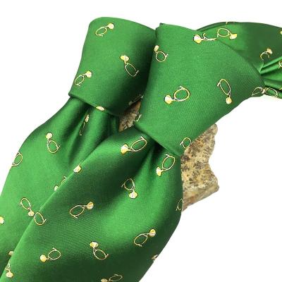 China 100% Custom Made 100% Silk Handmade Woven Jacquards All Over Logo Men's Green Necktie Exquisite Musical Instrument Horn for sale